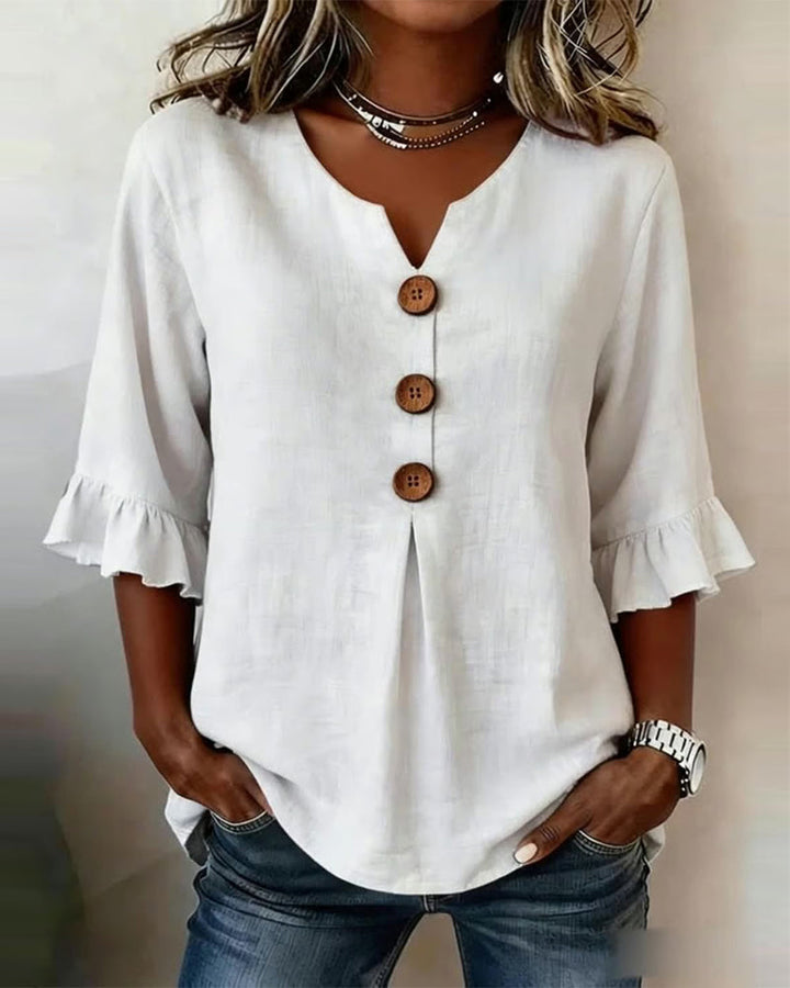 Blouse Sophia unie en coton-lin avec boutons en bois et volant