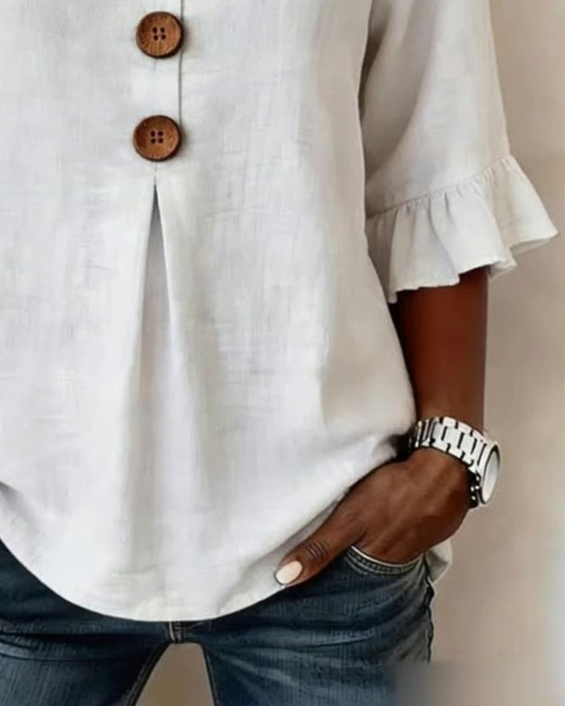 Blouse Sophia unie en coton-lin avec boutons en bois et volant