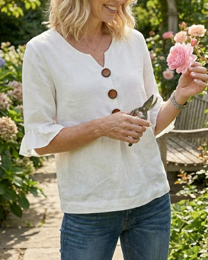 Blouse Sophia unie en coton-lin avec boutons en bois et volant