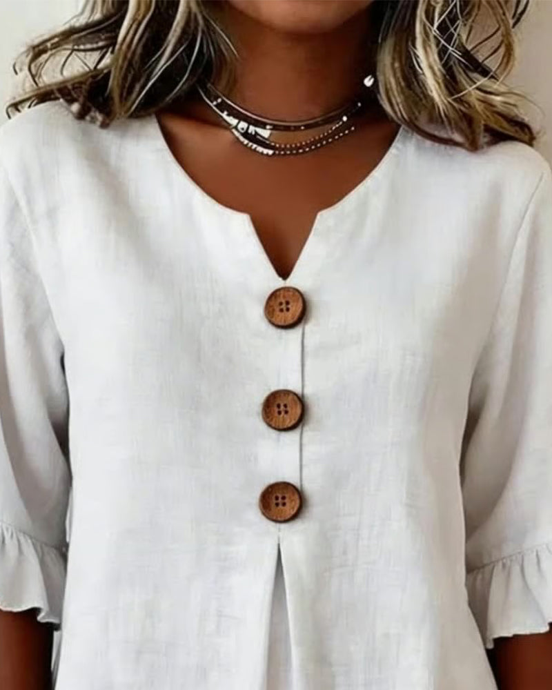 Blouse Sophia unie en coton-lin avec boutons en bois et volant
