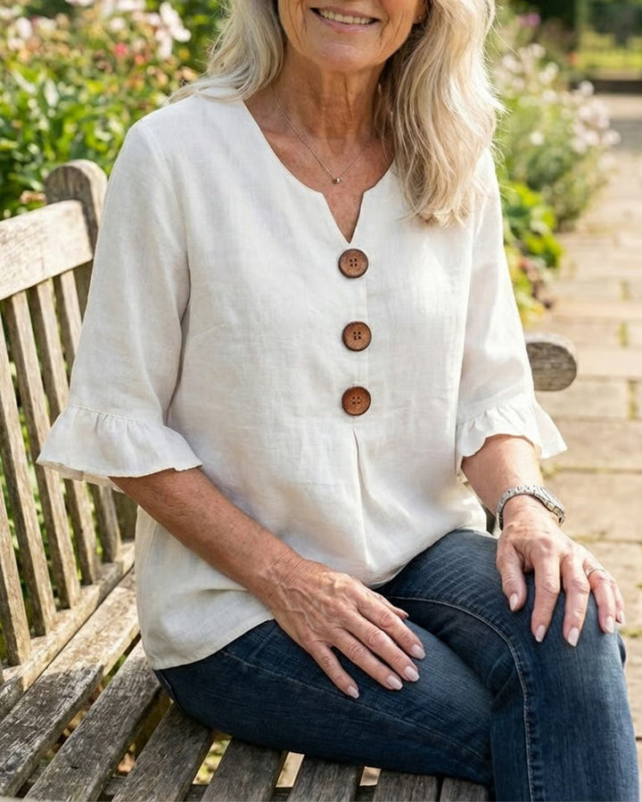 Blouse Sophia unie en coton-lin avec boutons en bois et volant
