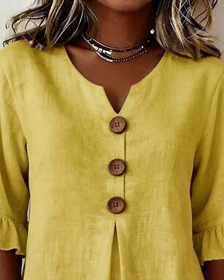 Blouse Sophia unie en coton-lin avec boutons en bois et volant