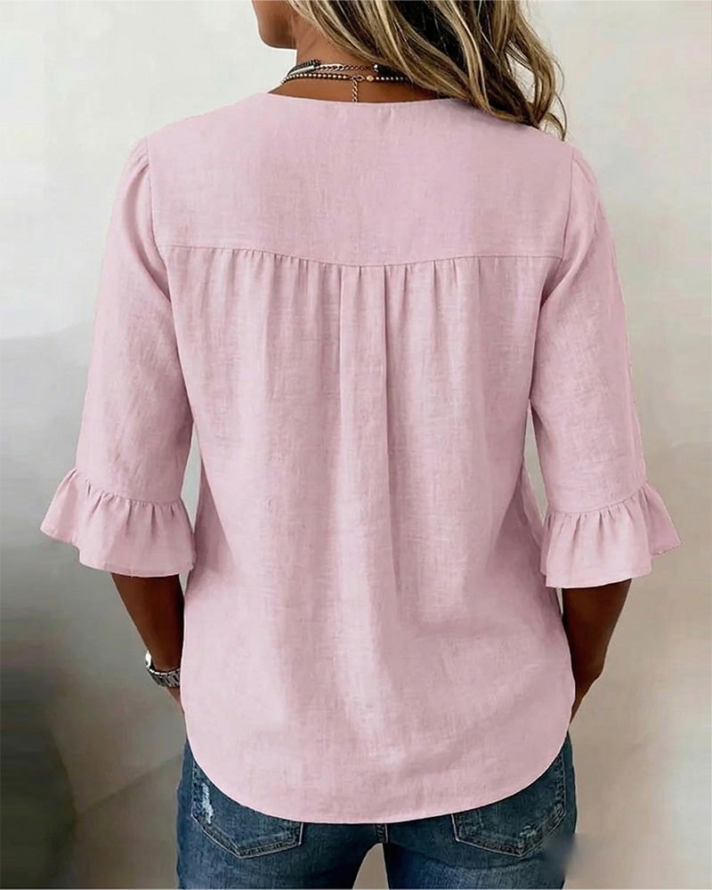 Blouse Sophia unie en coton-lin avec boutons en bois et volant