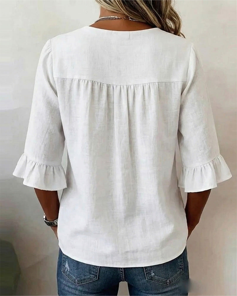 Blouse Sophia unie en coton-lin avec boutons en bois et volant